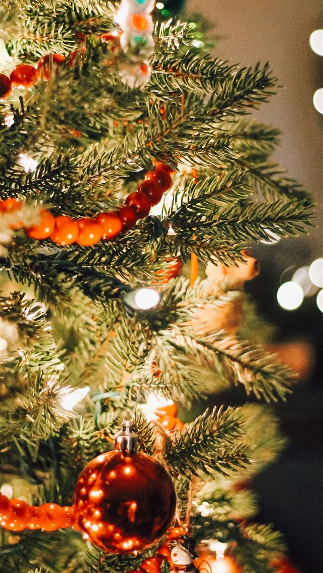 1290x2796 orange and white baubles on green christmas tree - tree iPhone Wallpaper