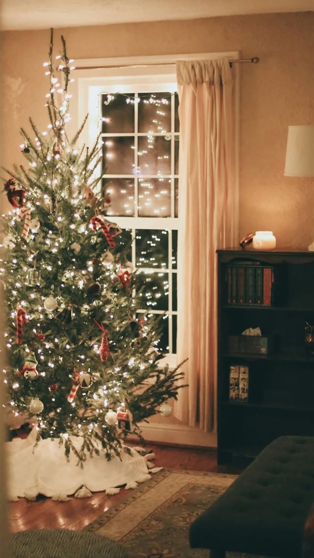 1290x2796 green christmas tree with baubles near brown woode... - christmas tree iPhone Wallpaper