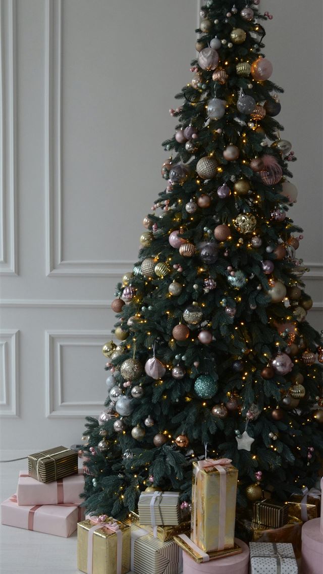 1290x2796 a decorated christmas tree surrounded by presents - winter iPhone Wallpaper