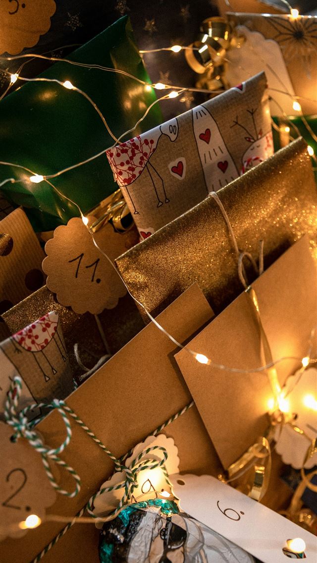 1290x2796 brown gift boxes with white string lights -  iphone 15 Wallpaper