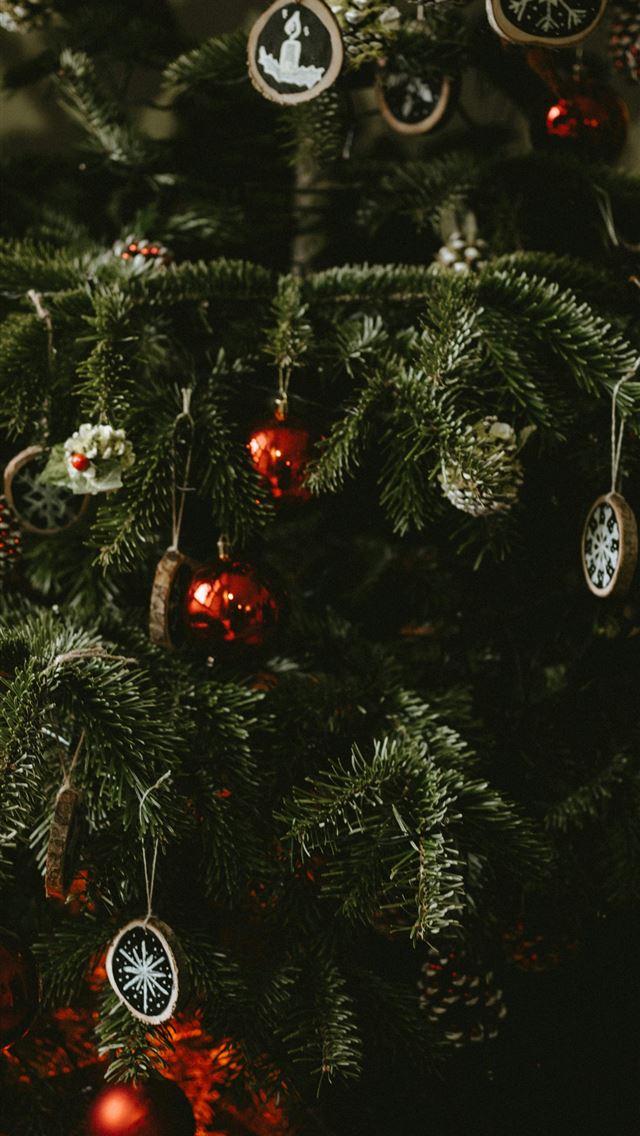 1290x2796 closeup photo of Christmas tree with baubles - tree iPhone Wallpaper