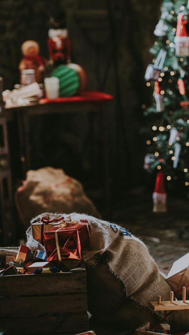 1290x2796 assorted toys near Christmas tree - christmas iPhone Wallpaper