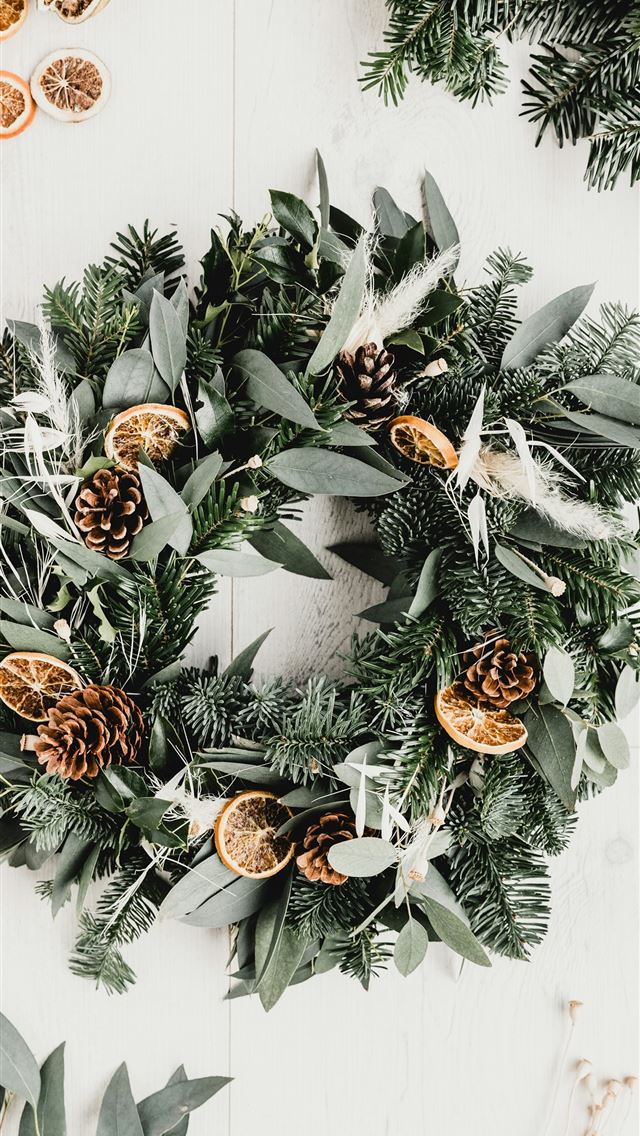 1290x2796 a wreath with pine cones and evergreen leaves - leaf iPhone Wallpaper