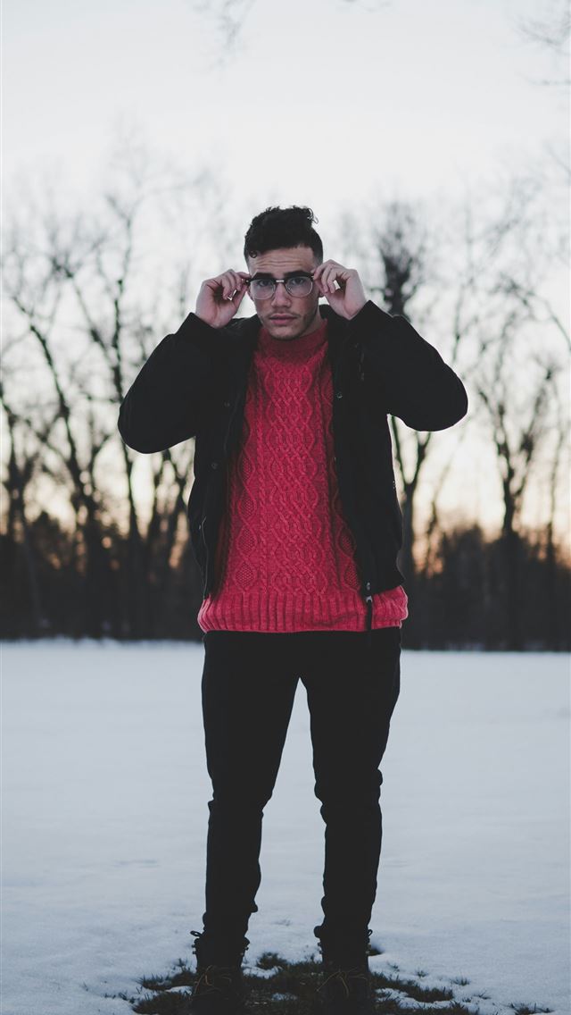 1290x2796 man standing holding his eyeglasses - christmas iPhone Wallpaper