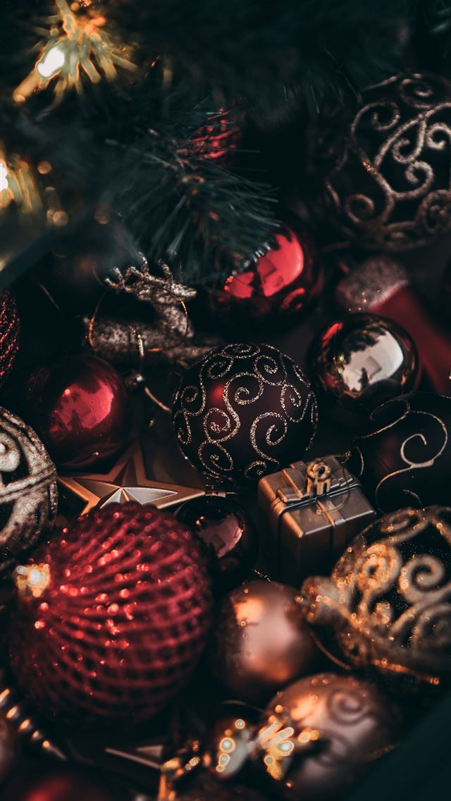 1290x2796 a close up of a christmas tree with ornaments - tree iPhone Wallpaper