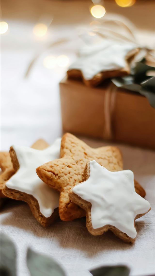 1290x2796 brown and white seashell on white textile - christmas iPhone Wallpaper