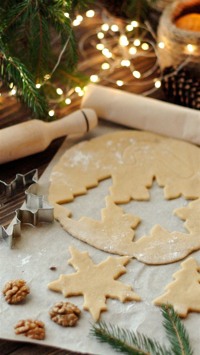 1290x2796 cookie cutter and rolling pin beside string lights - fruit iPhone Wallpaper