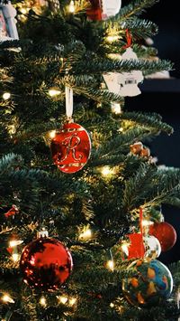 baubles hung on Christmas tree wallpaper