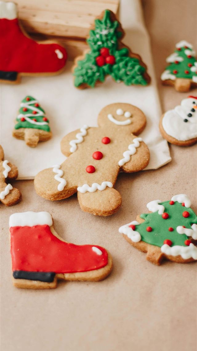 1290x2796 a table topped with lots of decorated cookies - cake iPhone Wallpaper