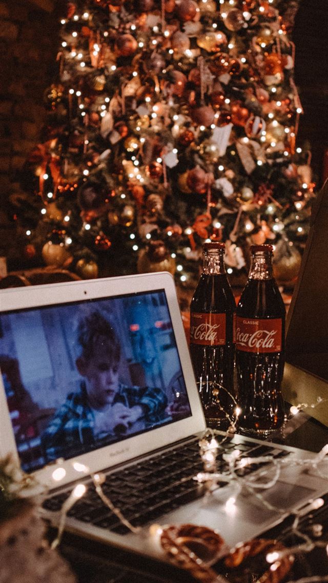 1290x2796 macbook air on table near christmas tree - tree iPhone Wallpaper