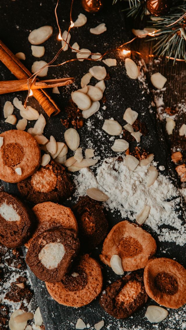 1290x2796 brown and white cookies on brown wooden table -  iphone 15 Wallpaper