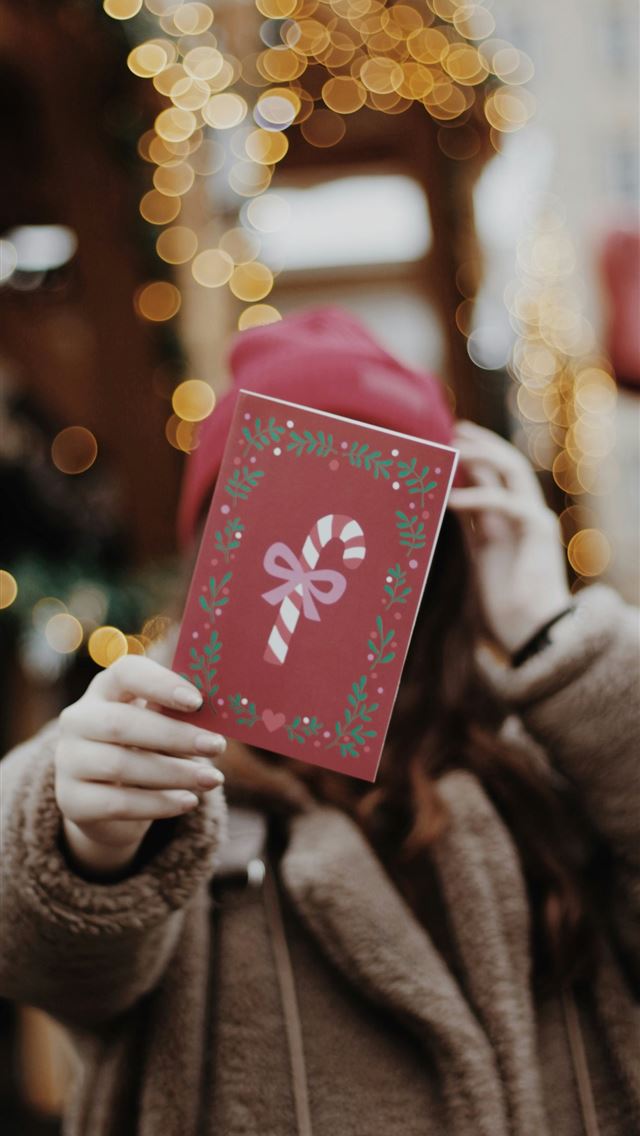 1290x2796 person holding red boxz - christmas iPhone Wallpaper