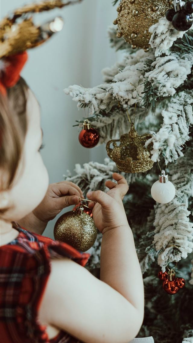 1290x2796 girl in red and white plaid dress holding gold and... - baby iPhone Wallpaper