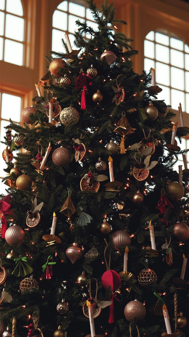 1290x2796 a decorated christmas tree in a large room - christmas iPhone Wallpaper