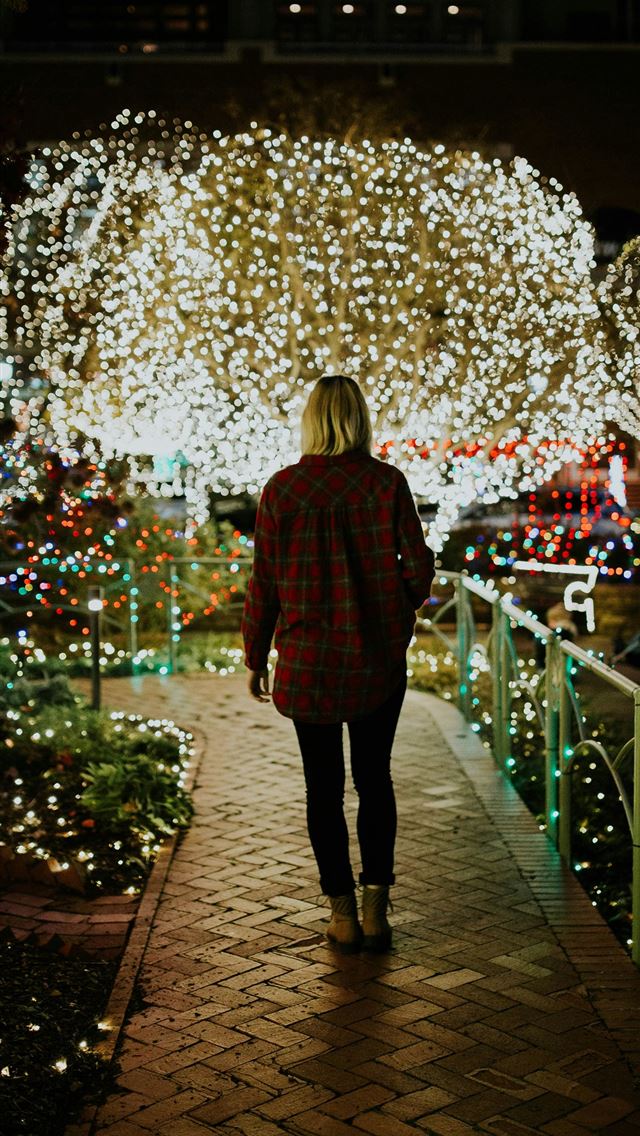 1290x2796 woman wearing brown jacket at night - christmas iPhone Wallpaper