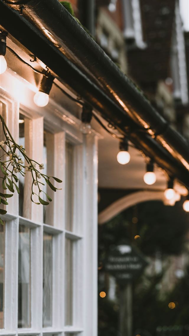 1290x2796 house with turned on string lights during day - grey iPhone Wallpaper