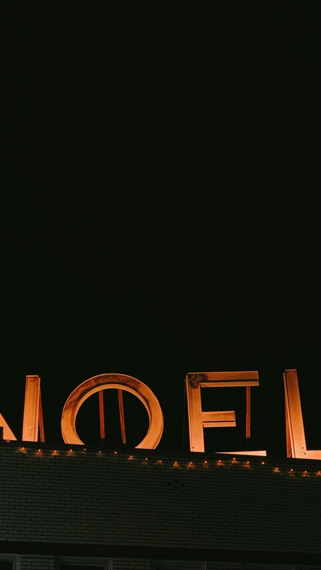 1290x2796 turned on orange noel freestanding letters - christmas iPhone Wallpaper