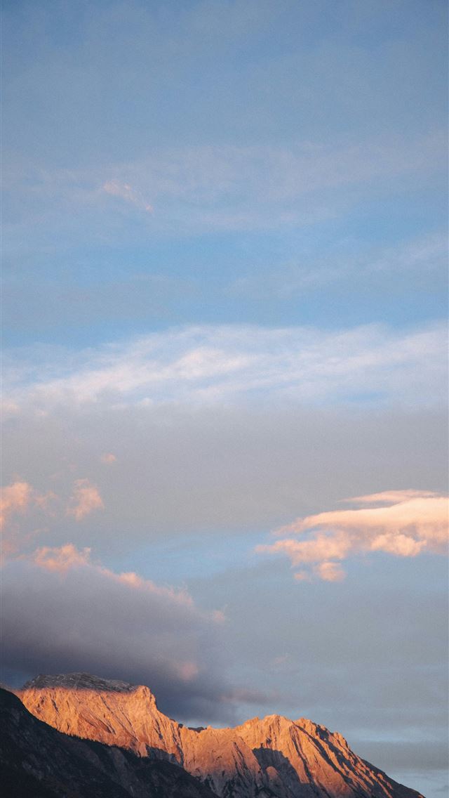 1290x2796 mountains under cloudy sky -  iPhone Wallpaper