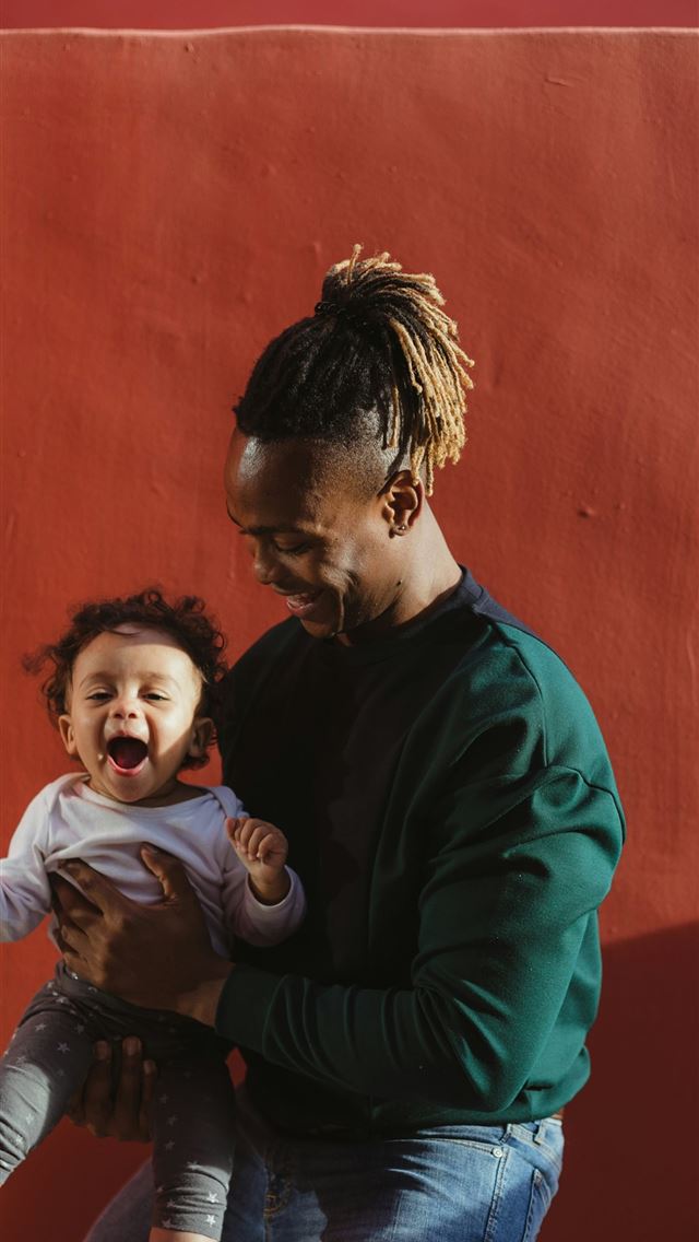 1290x2796 smiling man carrying child and playing -  iPhone Wallpaper