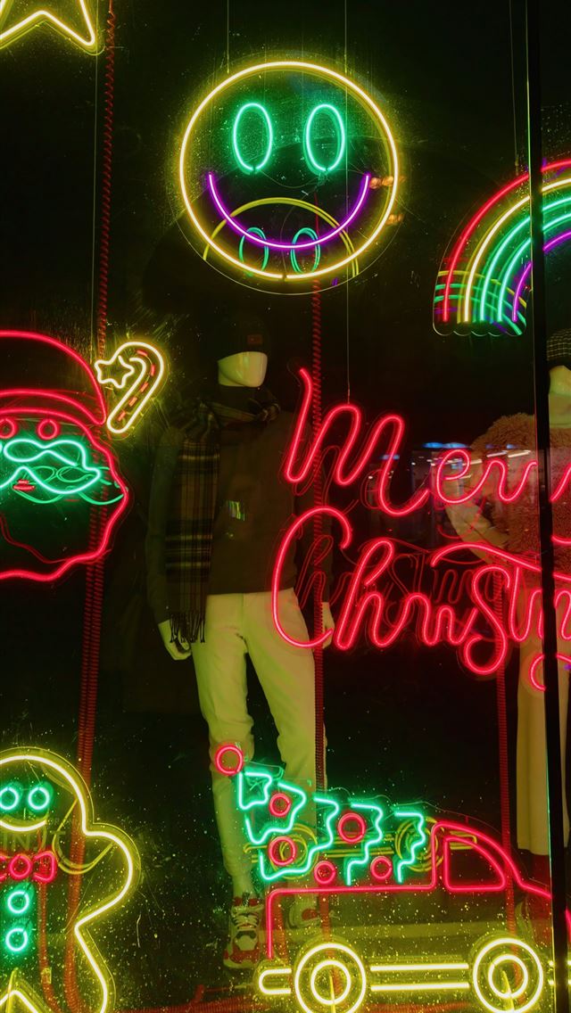1290x2796 a window display of christmas lights and decoratio... -  iPhone Wallpaper
