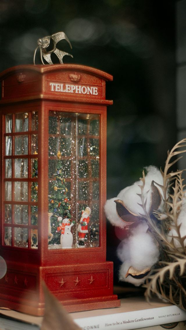 1290x2796 a telephone booth with cotton in front of it -  iPhone Wallpaper