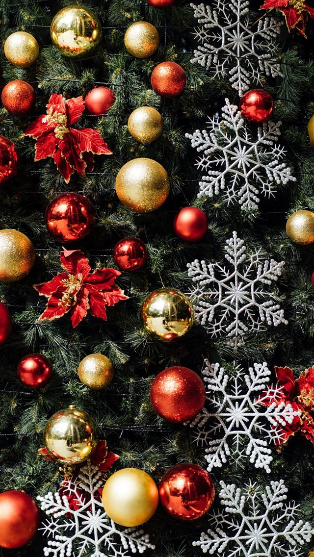 1290x2796 a christmas tree with red and gold ornaments -  iPhone Wallpaper