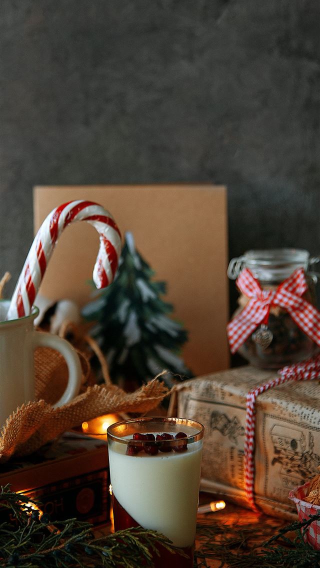 1290x2796 a cup of coffee on a table -  iPhone Wallpaper