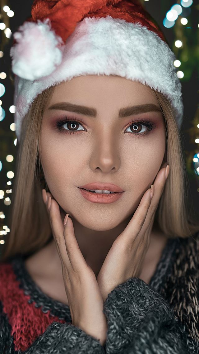 640x1136 woman wearing black sweater and Santa hat -  iPhone Wallpaper