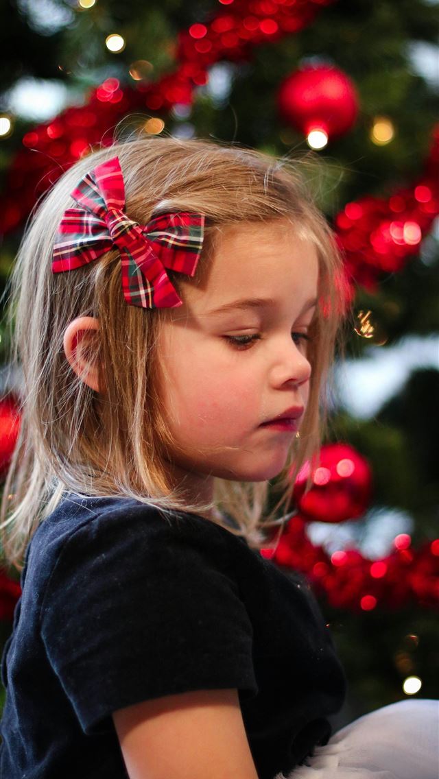 1290x2796 girl in black sweater with red and green ribbon on... -  iPhone Wallpaper