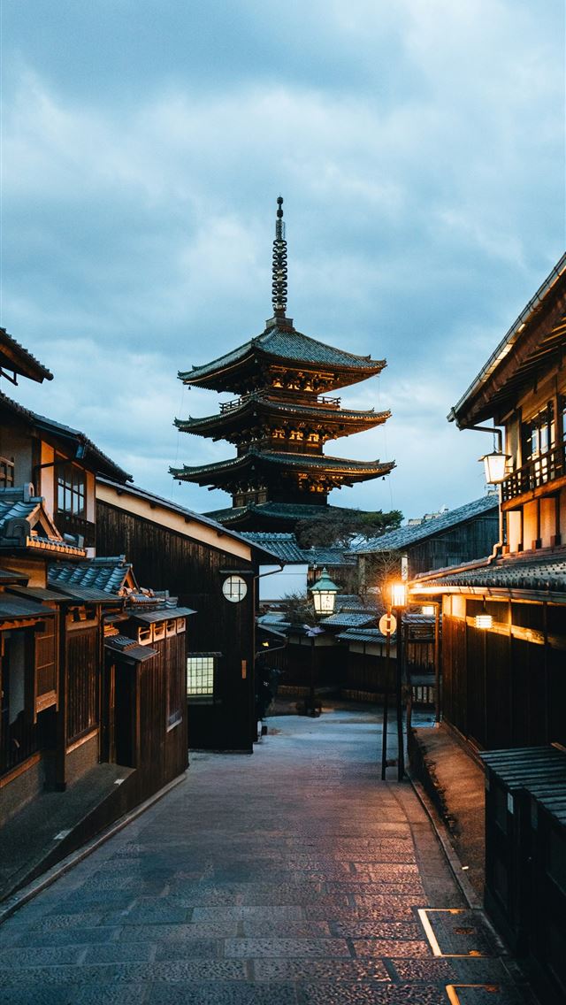 1290x2796 A temple stands tall in a japanese street  -  iPhone Wallpaper