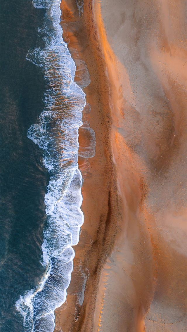1290x2796 Waves gently meet the sandy beach  -  iPhone Wallpaper