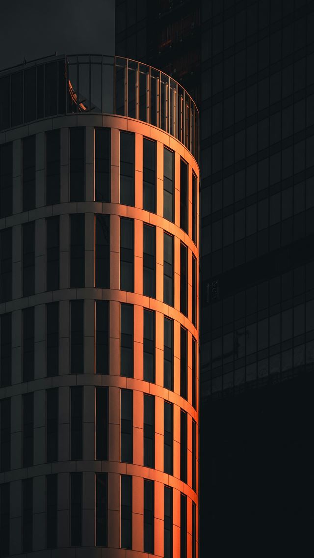 1290x2796 brown high rise building during night time -  iPhone Wallpaper