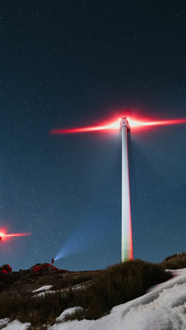1290x2796 Wind turbines glow under a starry night sky  -  iPhone Wallpaper