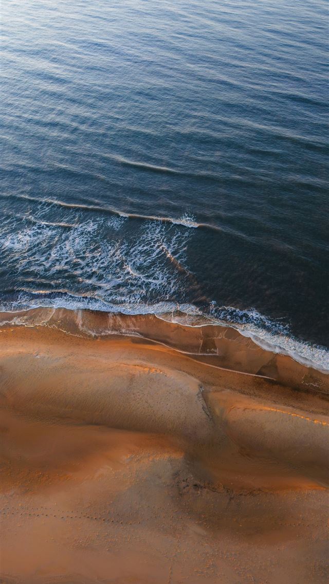 1290x2796 Aerial view of the ocean meeting the beach  -  iPhone Wallpaper