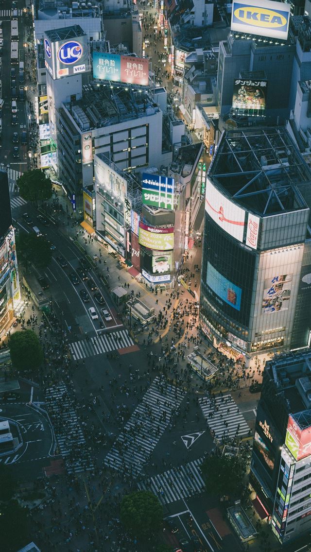 1290x2796 Aerial view of a crowded city intersection at nigh... -  iPhone Wallpaper