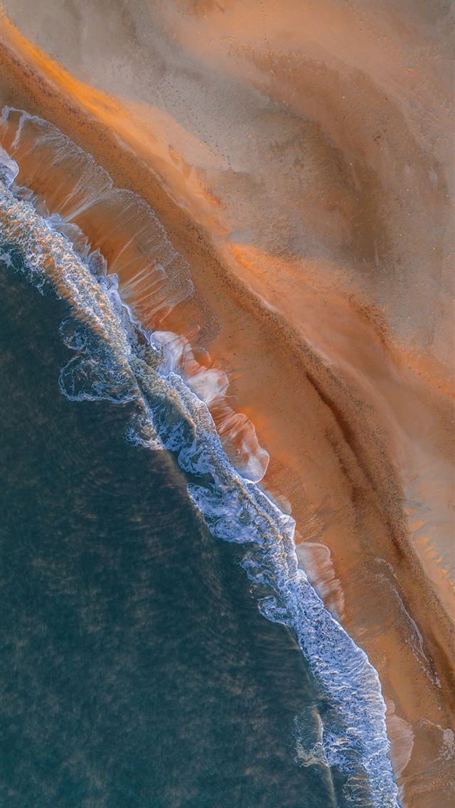 1290x2796 Waves crash on a beautiful sandy beach  -  iPhone Wallpaper