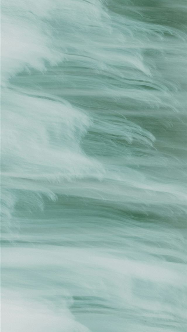 1290x2796 A blurry photo of a surfboard in the water -  iPhone Wallpaper