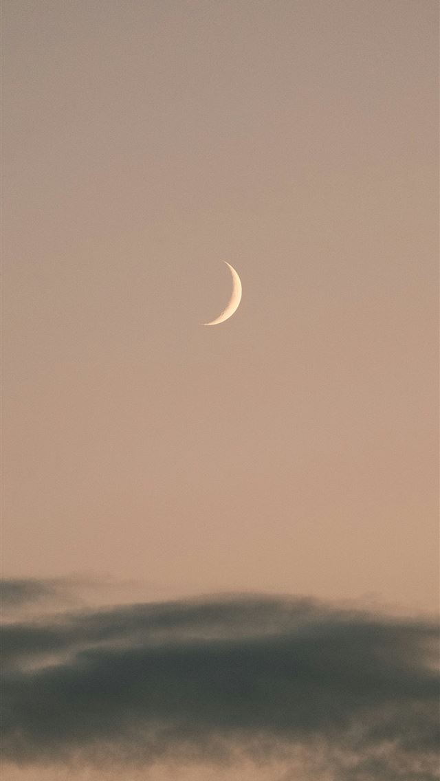 640x1136 A half moon is seen in the sky -  iPhone Wallpaper