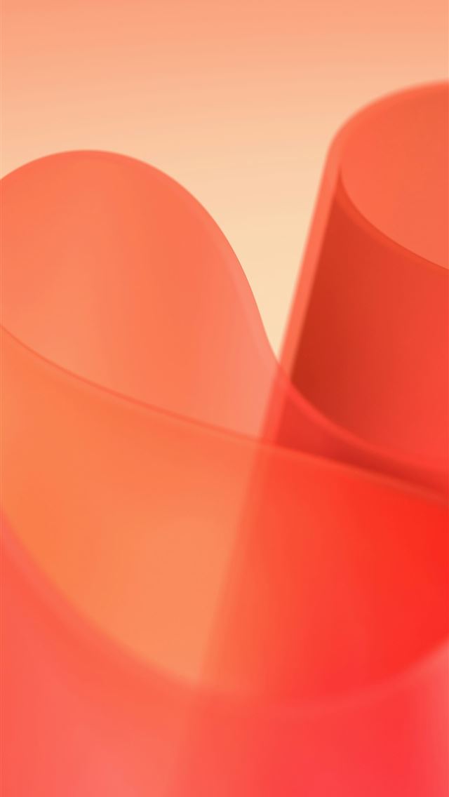 1290x2796 A close up of a red object with a blurry backgroun... -  iPhone Wallpaper