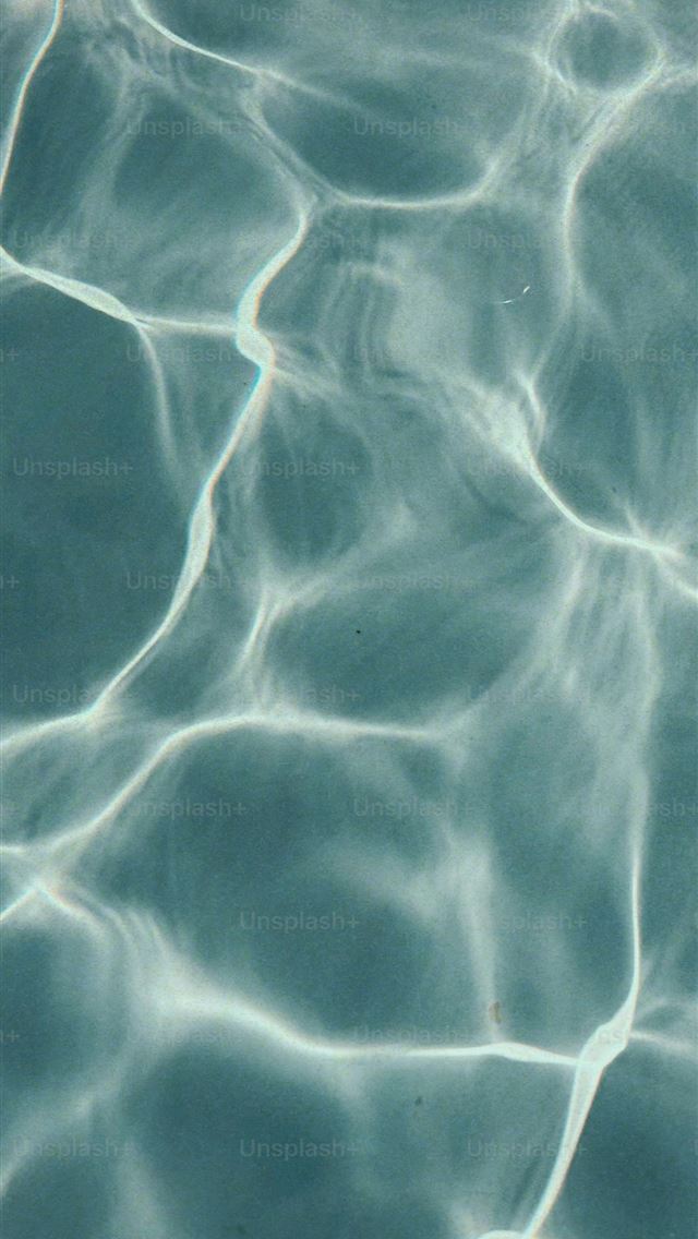 1290x2796 a close up of a pool with clear water -  iPhone Wallpaper