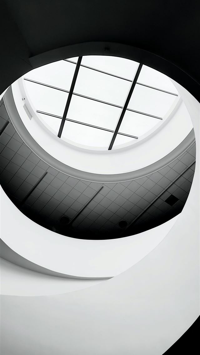 1290x2796 A black and white photo of a circular window -  iPhone Wallpaper