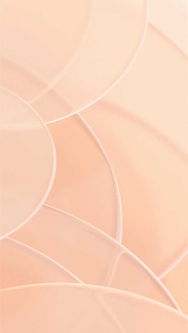 1290x2796 A blurry photo of a cell phone with circles on it -  iPhone Wallpaper