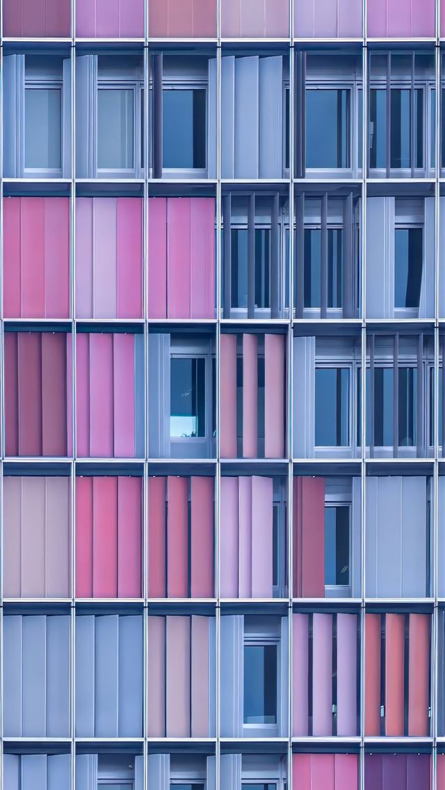 1290x2796 A multicolored building with lots of windows -  iPhone Wallpaper