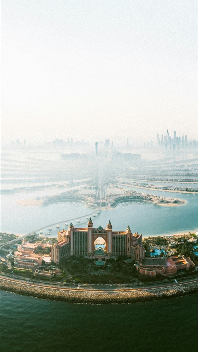 1242x2688 An island in the middle of a body of water -  iPhone Wallpaper