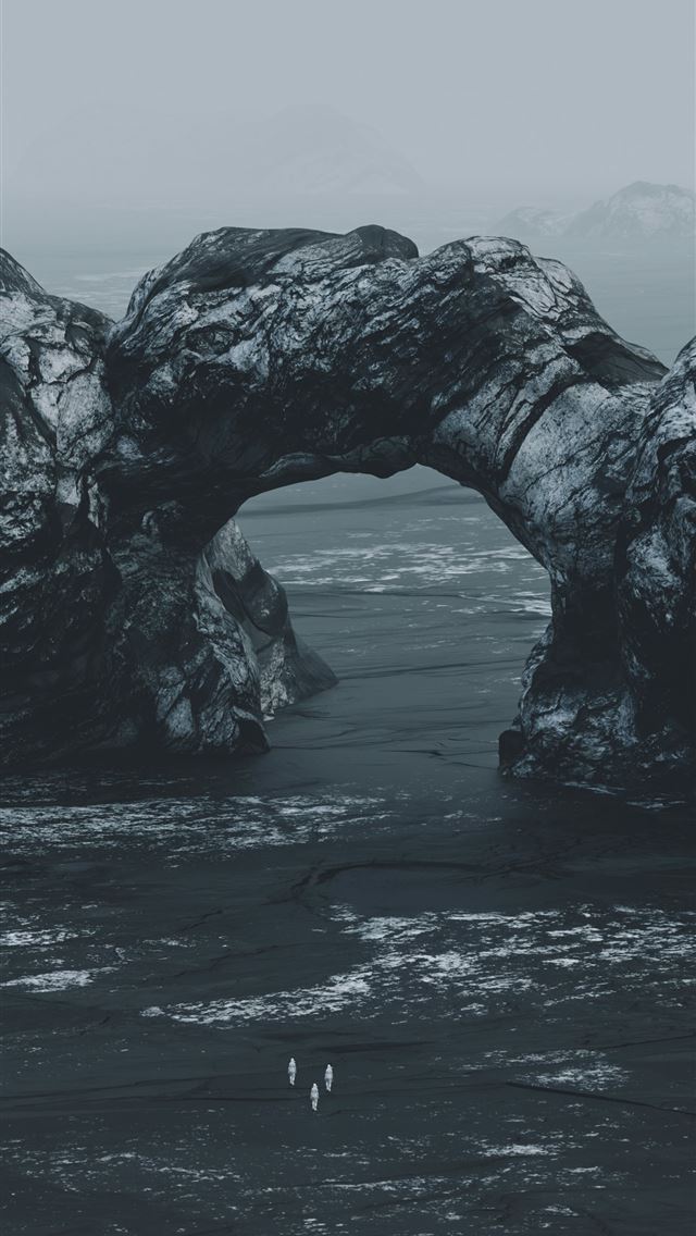 1290x2796 A black and white photo of rocks in the ocean -  iPhone Wallpaper