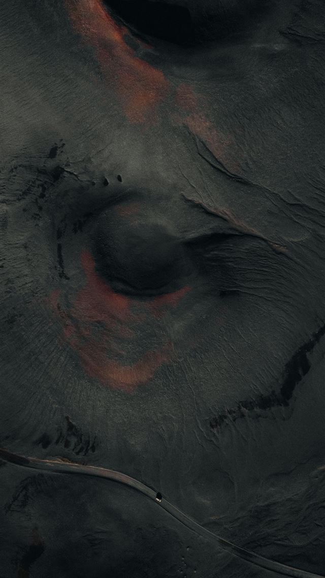 1290x2796 A close up of an elephant's skin with a red spot -  iPhone Wallpaper