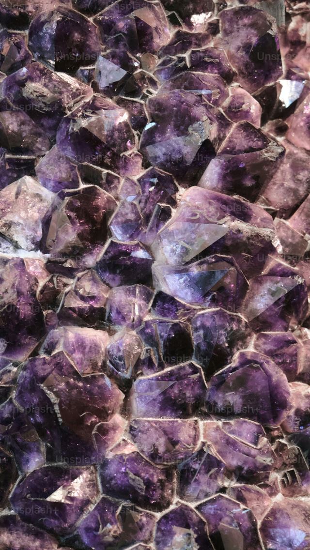 1290x2796 a close up of a rock with purple crystals -  iPhone Wallpaper