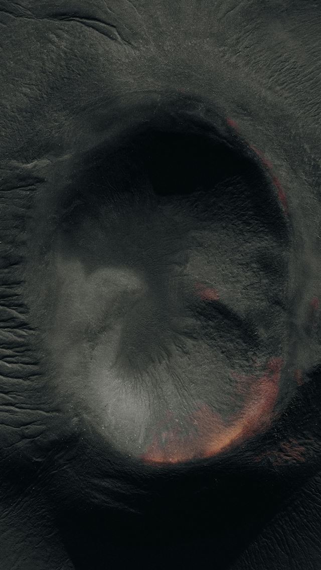 1290x2796 A close up of a piece of black material -  iPhone Wallpaper
