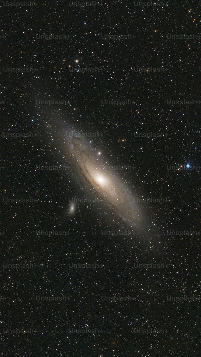 1290x2796 a very large galaxy in the middle of the night sky -  iPhone Wallpaper