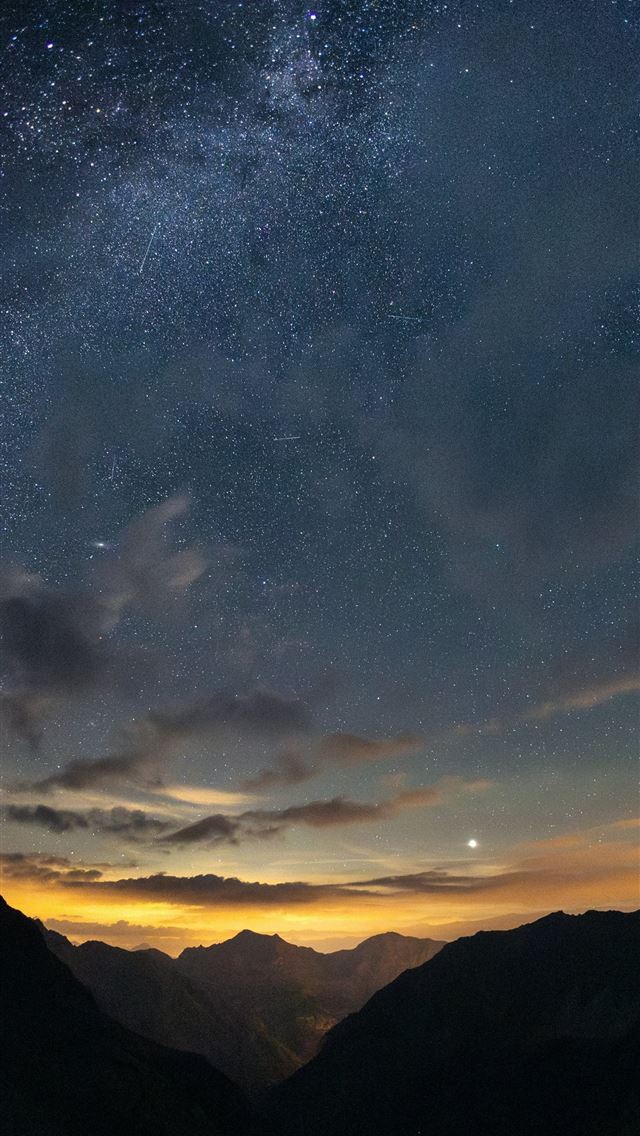 1290x2796 Milky way shines over a mountain valley  -  iPhone Wallpaper